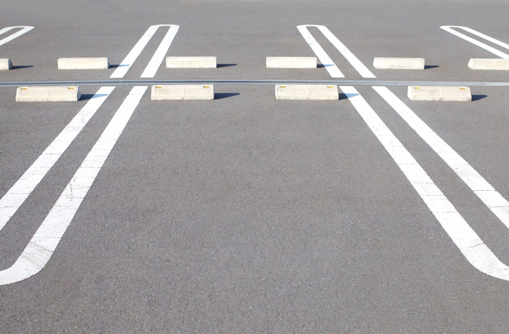 A street with white lines and some white markings